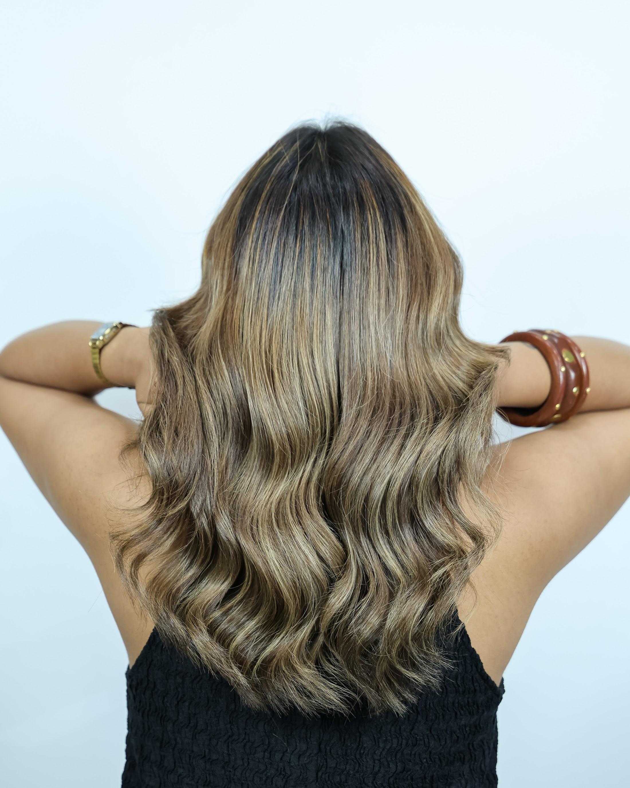 Glossy blonde waves styled at Kutz The Salon